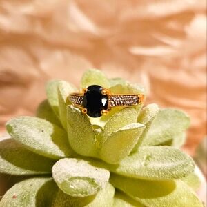 Gold Tone Ring with Black Stone